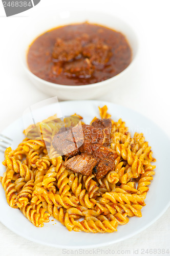 Image of fusilli pasta with neapolitan style ragu meat sauce