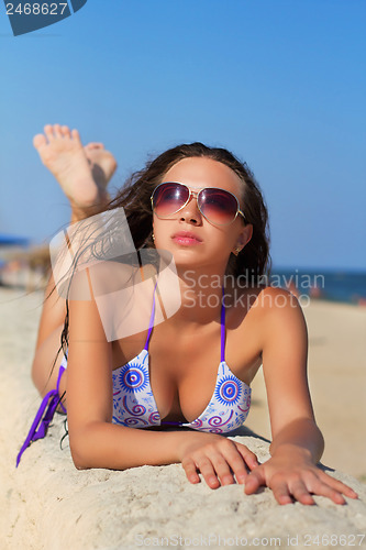 Image of Young thoughtful woman