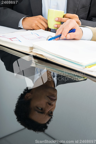 Image of Reflection Of Businessman