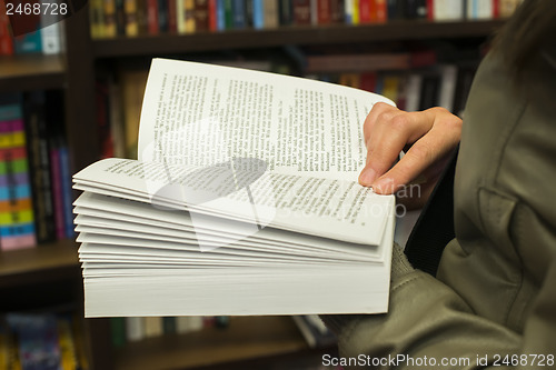 Image of Open book in a bookstore