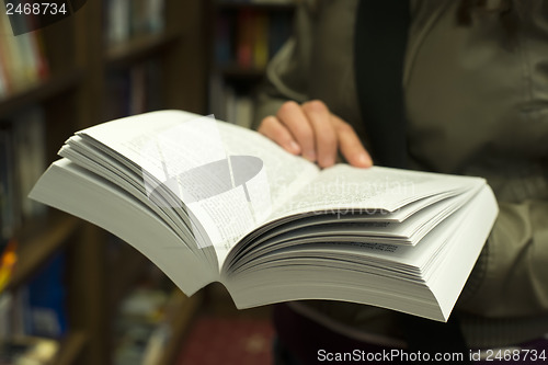 Image of Open book in a bookstore