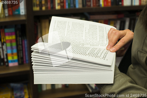 Image of Open book in a bookstore