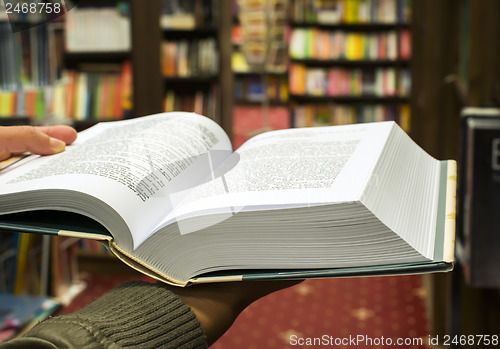 Image of Open book in a bookstore