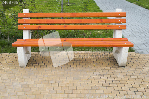 Image of Wooden benches in a park