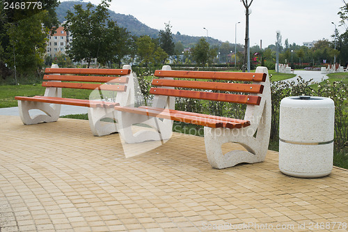 Image of Wooden benches in a park