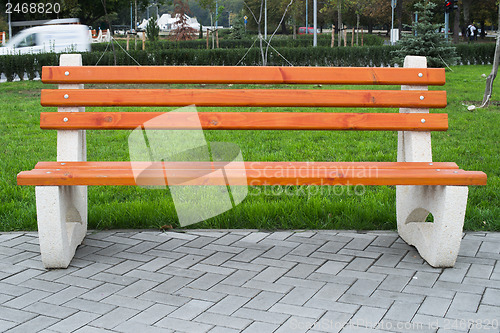 Image of Wooden benches in a park