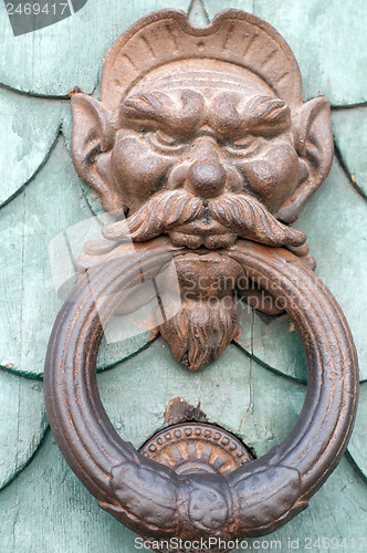 Image of Vintage knocker door of metal face