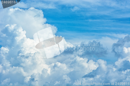 Image of Large cumulus clouds in a blue sky