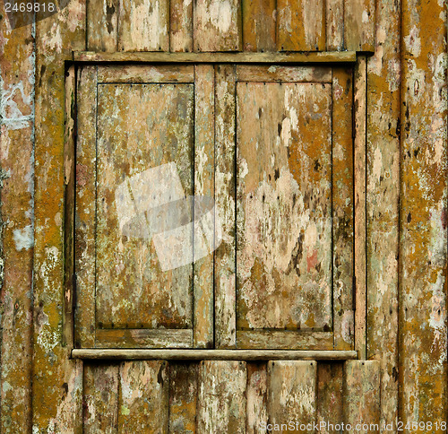 Image of Shuttered window of old wooden house