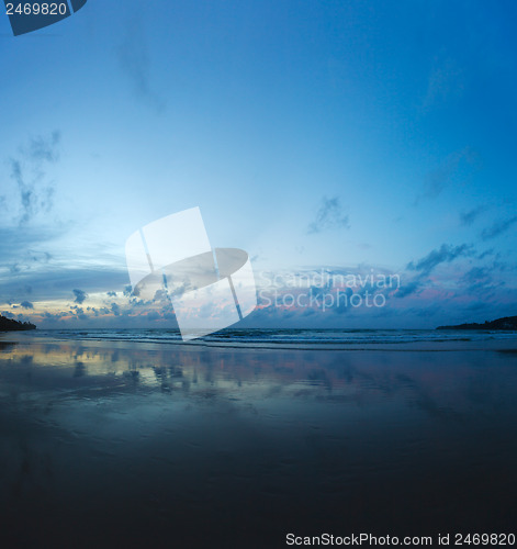 Image of Evening on the beach - beautiful reflection of clouds