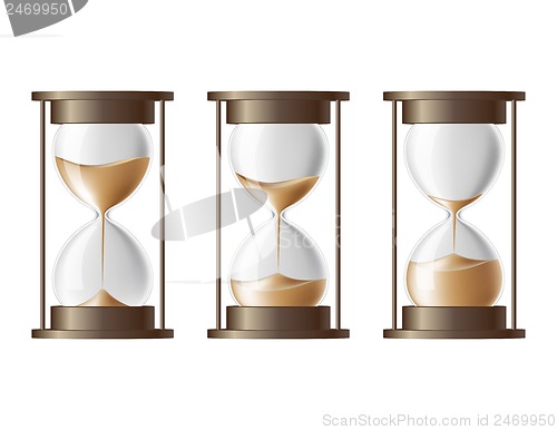 Image of Sand falling in the hourglass.