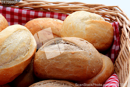 Image of Tasty fresh bread rolls in a basket