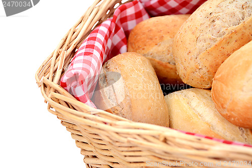 Image of Closeup of fresh bread rolls in a wicker basket