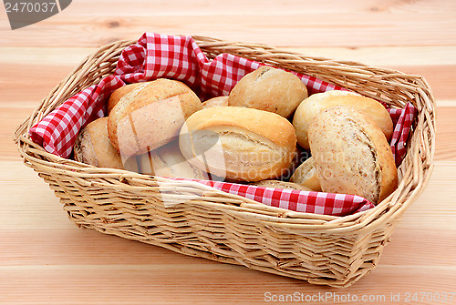 Image of Basket full of fresh bread rolls