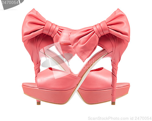 Image of Evening pink shoes with a bow on a high heel. collage