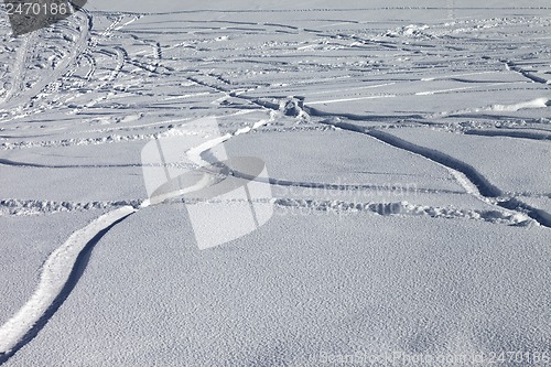 Image of Trace of ski and snowboards in new-fallen snow