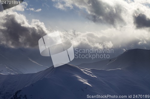 Image of Evening mountain and sunlight clouds