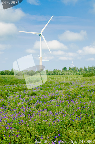 Image of Summer landscape with wind generators  