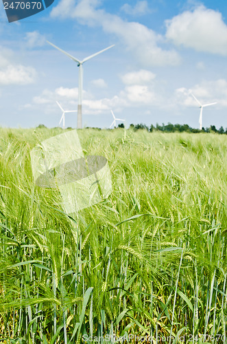 Image of Summer landscape with wind generators  