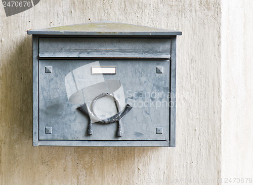 Image of Old mailbox on a building wall, close-up  