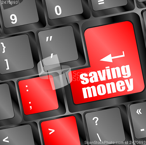 Image of saving money button on computer keyboard key