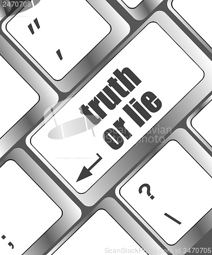 Image of Wording truth or lie on computer keyboard