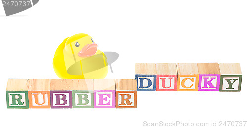 Image of Baby blocks spelling rubber ducky and a rubber duck