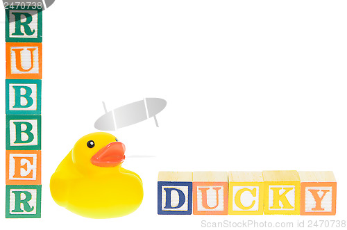 Image of Baby blocks spelling rubber ducky and a rubber duck