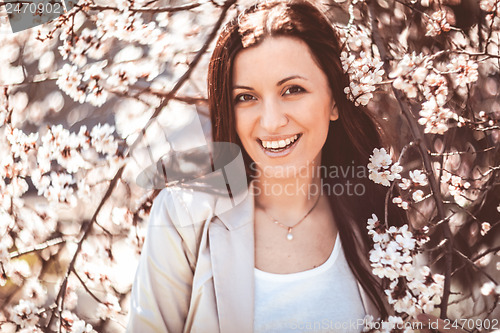 Image of Woman in spring garden