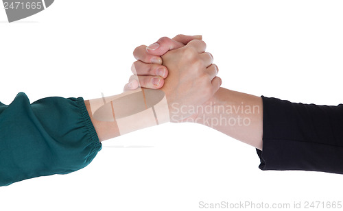 Image of Close up of two women shaking hands