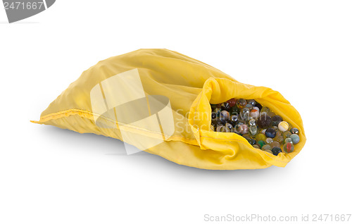 Image of Assorted black glass marbles arranged in a yellow pouch