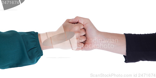 Image of Close up of two women shaking hands