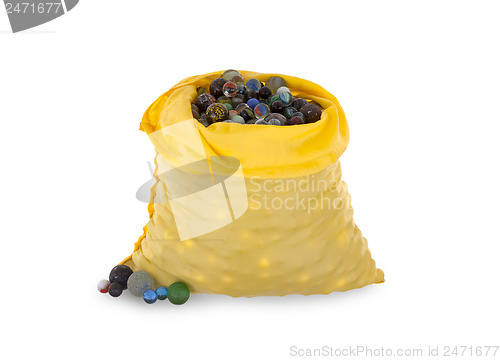 Image of Assorted black glass marbles arranged in a yellow pouch