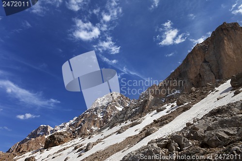 Image of Rocks with snow at nice day