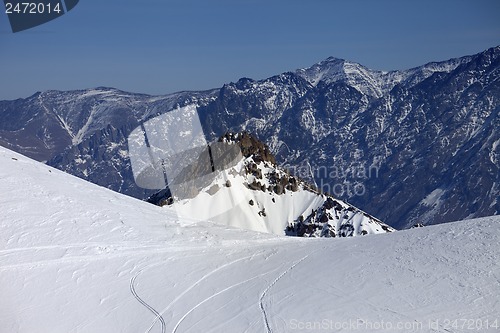 Image of Trace from ski and snowboards on off-piste slope