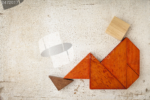 Image of tangram sitting figure