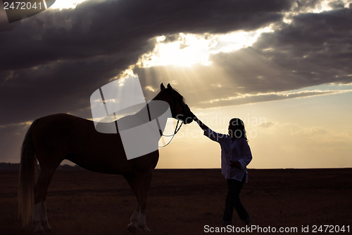 Image of Woman and horse