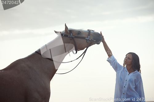 Image of Woman and horse