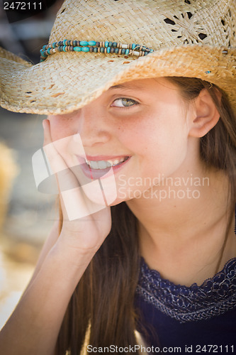 Image of Preteen Girl Portrait Wearing Cowboy Hat