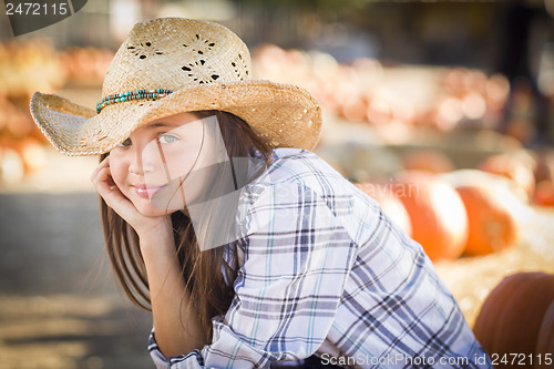 Image of Preteen Girl Portrait at the Pumpkin Patch