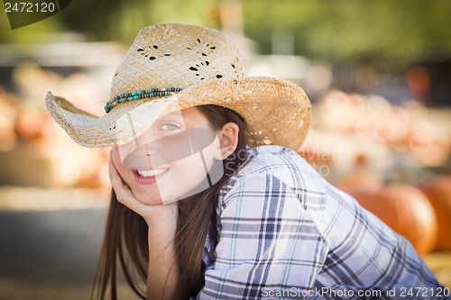 Image of Preteen Girl Portrait at the Pumpkin Patch