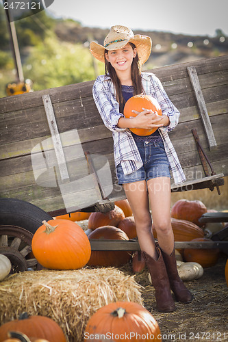 Image of Preteen Girl Portrait at the Pumpkin Patch