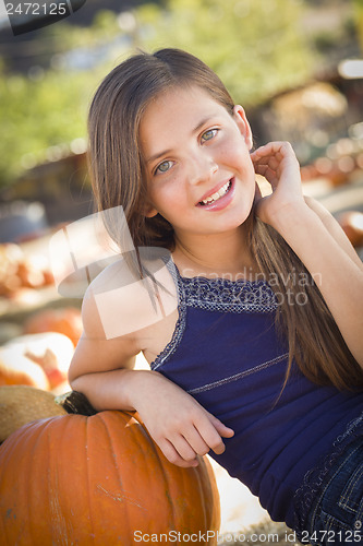 Image of Preteen Girl Portrait at the Pumpkin Patch