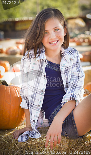 Image of Preteen Girl Portrait at the Pumpkin Patch