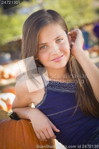 Image of Preteen Girl Portrait at the Pumpkin Patch