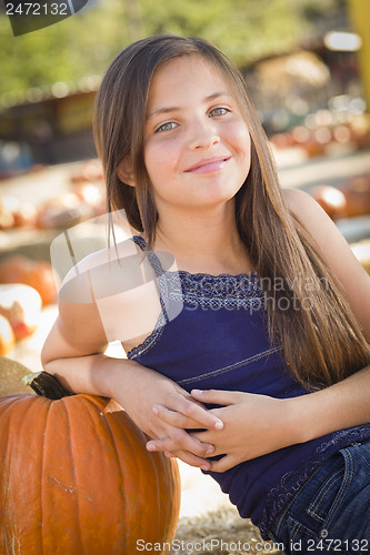 Image of Preteen Girl Portrait at the Pumpkin Patch