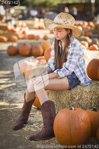 Image of Preteen Girl Portrait at the Pumpkin Patch