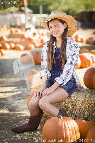 Image of Preteen Girl Portrait at the Pumpkin Patch