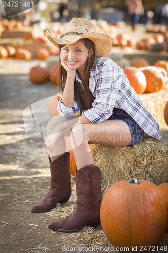 Image of Preteen Girl Portrait at the Pumpkin Patch