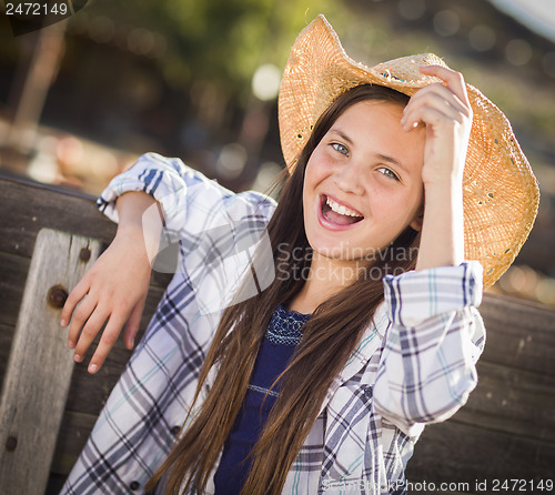 Image of Preteen Girl Portrait at the Pumpkin Patch